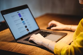 hands working on a computer