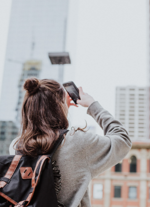 Women taking a photo of the skyline