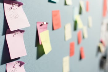 Postit notes pinned to a board