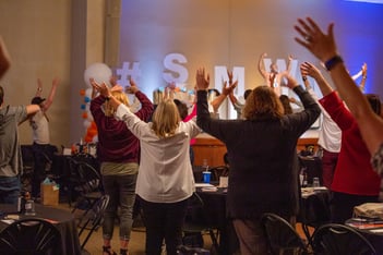 SMWL21 Group with hands raised