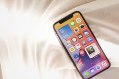 iPhone on a bed